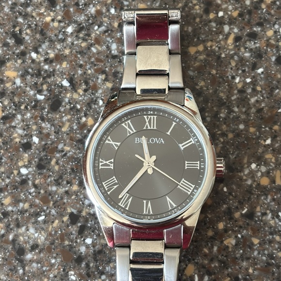 Bulova Silver Watch with Roman Numerals and Elegant Design - Picture 1 of 4